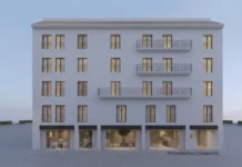 El centro histórico de Gandia impulsa su oferta urbana: arrancan las obras del Hotel Sofía Fachada de un edificio blanco de cinco plantas con balcones y locales comerciales en la planta baja